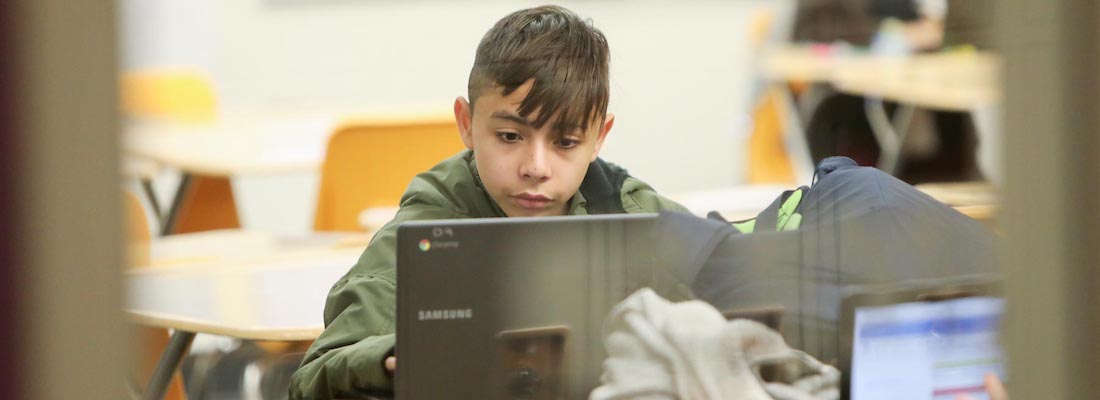 Student using a laptop device